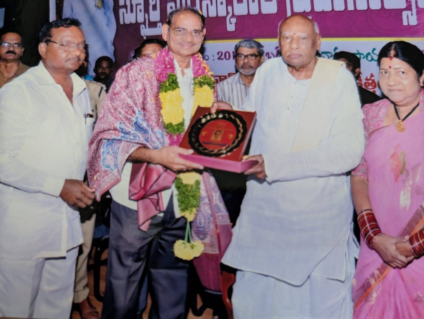 Felicitation by Sri Konijeti Rosaiah, former Governor of Tamil Nadu, 2014.